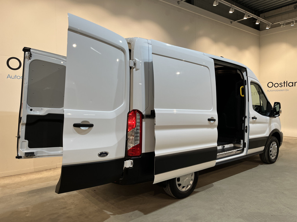 Ford E-Transit 350 L2H2 Trend 68 kWh / 100% Elektrisch !! / Airco / Cruise Control / CarPlay / Camera / Navigatie / 3-Zits / 12.000 KM !! 21