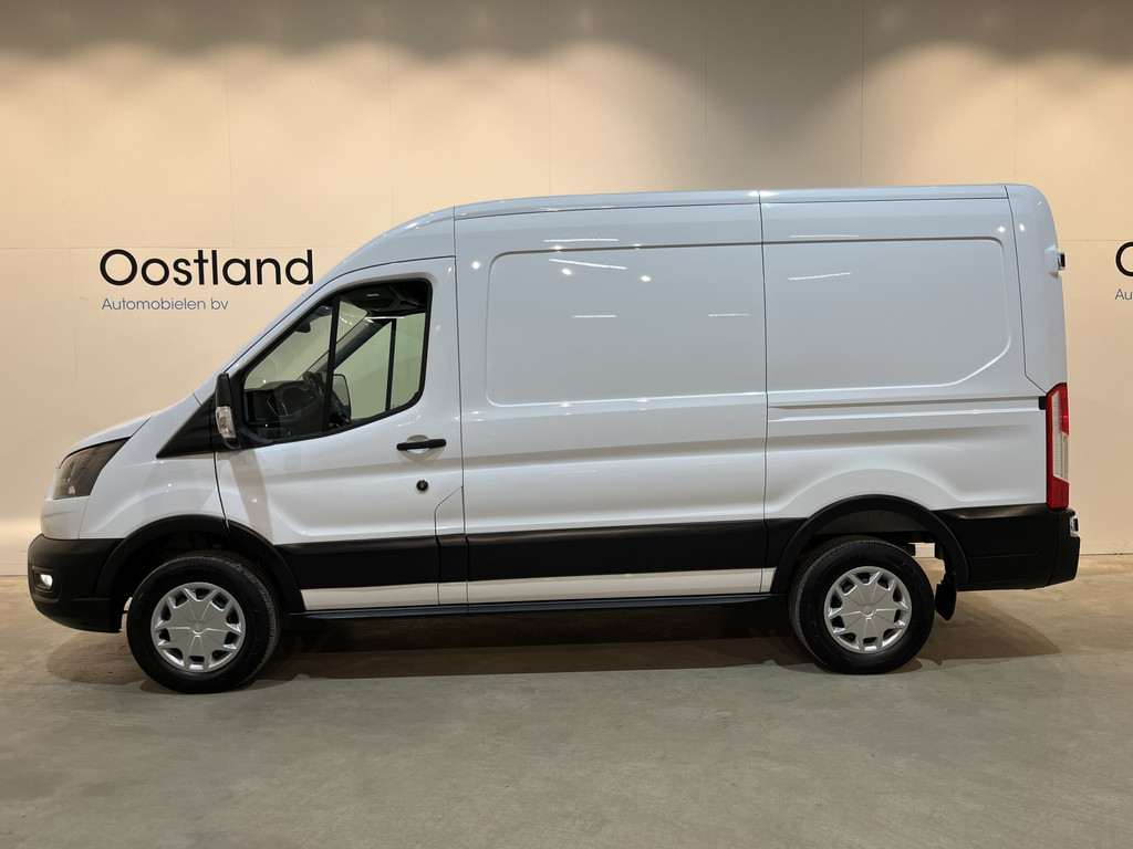 Ford E-Transit 350 L2H2 Trend 68 kWh / 100% Elektrisch !! / Airco / Cruise Control / CarPlay / Camera / Navigatie / 3-Zits / 12.200 KM !! 2