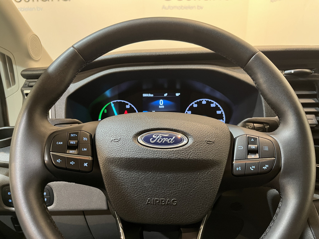 Ford E-Transit 390 (3500 kg) L2H2 Trend 68 kWh / 100% Elektrisch !! / Airco / Cruise Control / CarPlay / Camera / Navigatie / 3-Zits / 4.000 KM !! 12