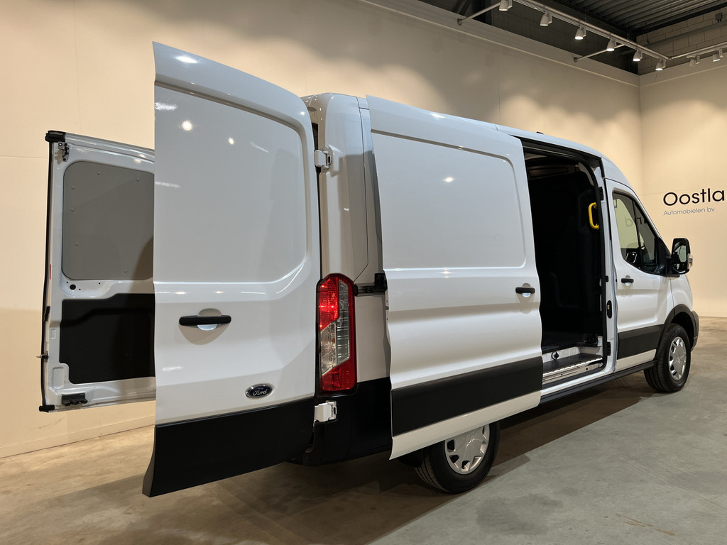 Ford E-Transit L2H2 Trend 68 kWh 184 PK / 100% Elektrisch !! / Airco / Cruise Control / CarPlay / Camera / Navigatie / 3-Zits / 11.750 KM !! 19