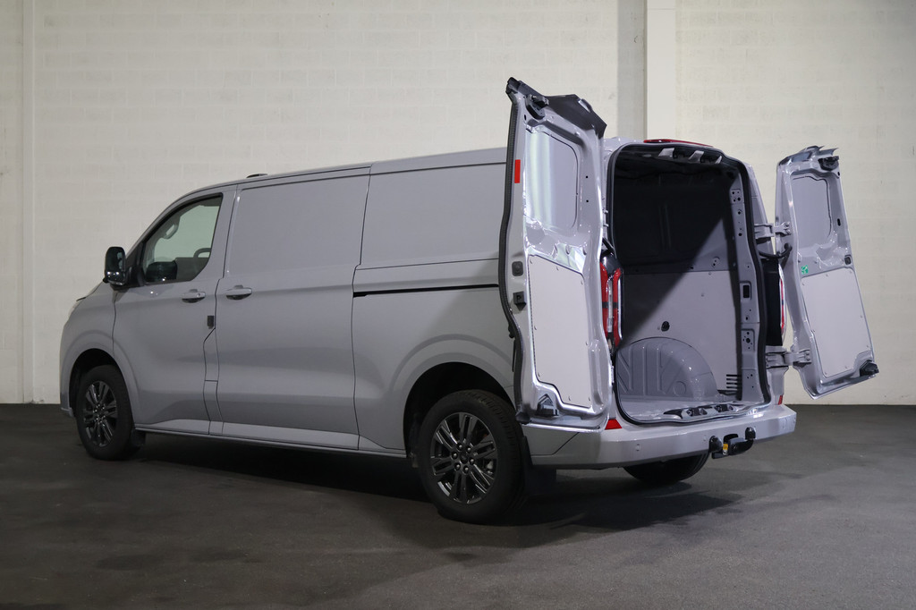 Ford E-Transit Cust. 320 L2 H1 Limited 65 kWh 218pk 2x Schuifdeur Trekhaak B&O Audio 12