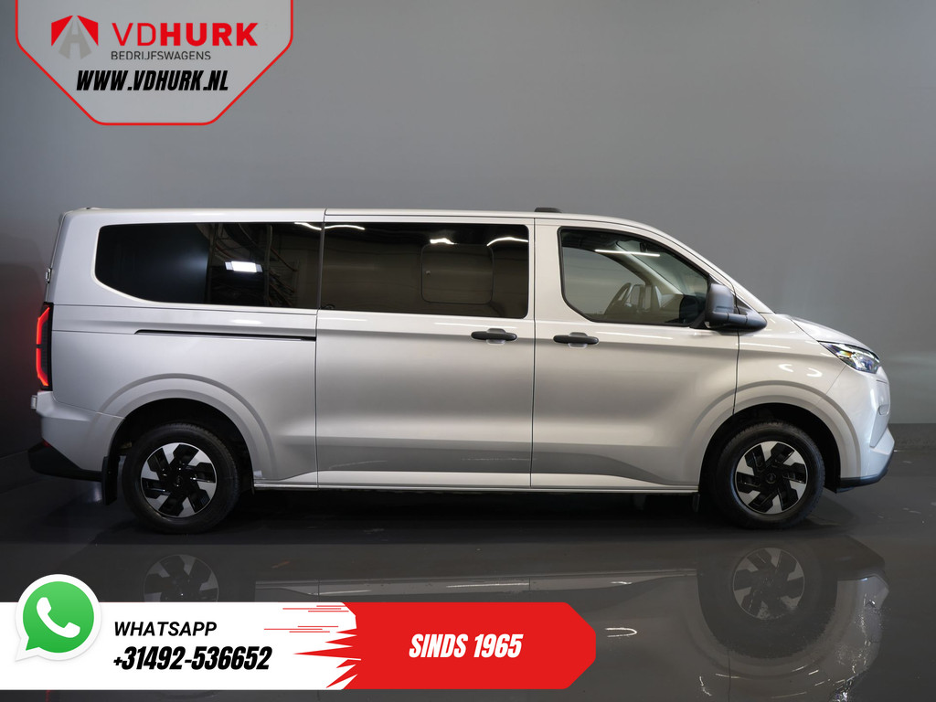 Ford E-Transit Custom 320 km WLTP L2 Combi/ Kombi/ 9 pers./ LED/ Standkachel/ Stoelverw/ Stuurverw./ Carplay/ Camera/ Climate/ PDC/ Cruise 11