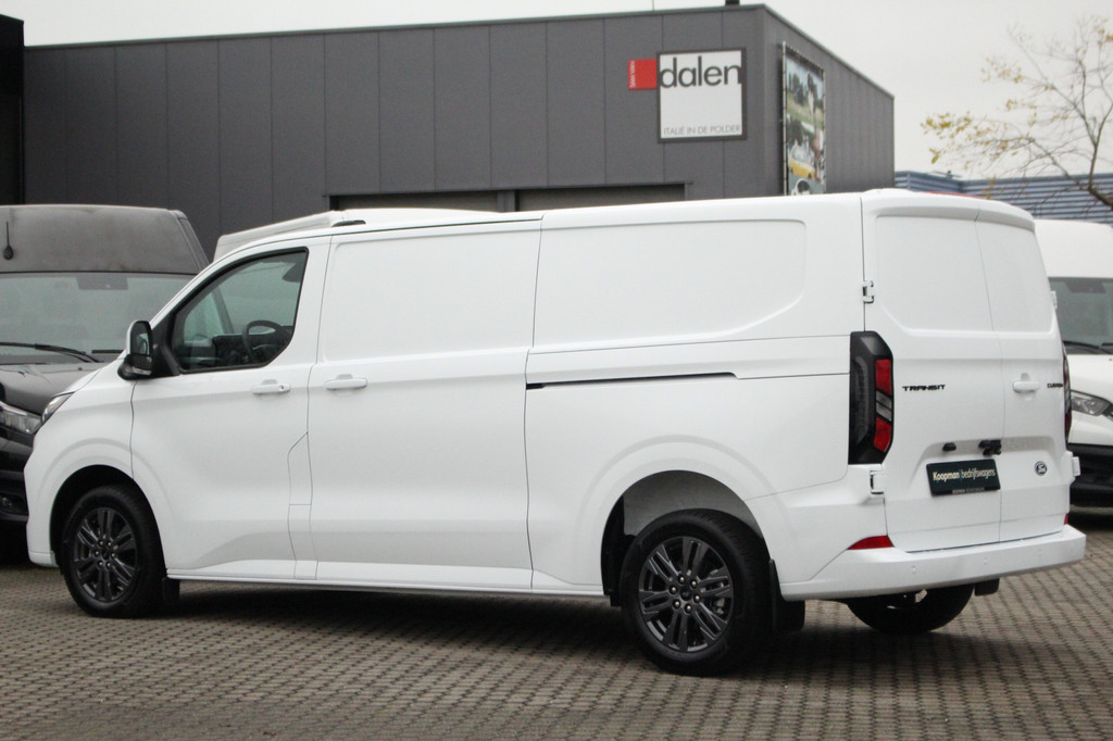 Ford E-Transit Custom 340 L2H1 Limited 71 kWh L2H1 Limited | Automaat | Trekgewicht 2300kg | L + R Zijdeur | Cruise | Stoel+Stuurvwer. | LED | Carplay | Keyless | Camera | Lease 771,- p/m 12