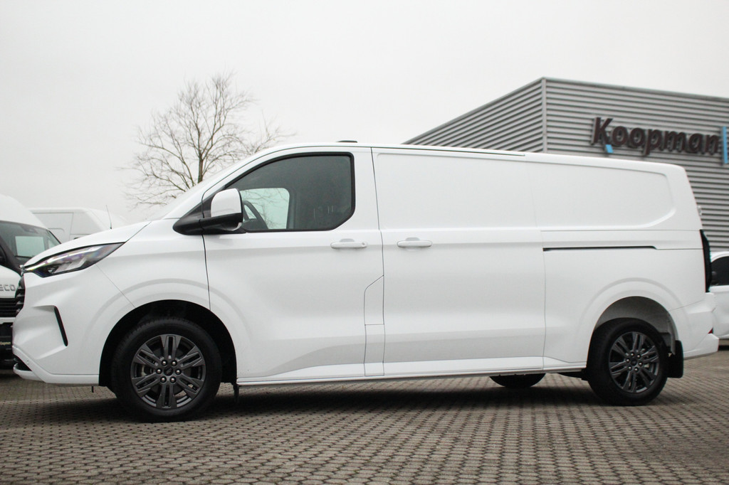 Ford E-Transit Custom 340 L2H1 Limited 71 kWh L2H1 Limited | Automaat | Trekgewicht 2300kg | L + R Zijdeur | Cruise | Stoel+Stuurvwer. | LED | Carplay | Keyless | Camera | Lease 771,- p/m 15