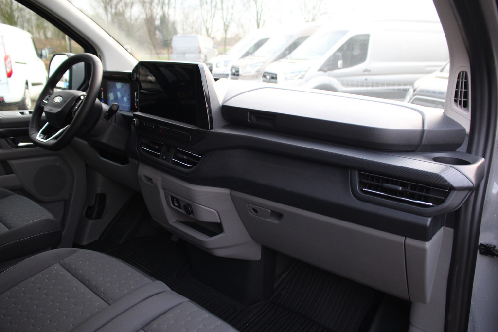 Ford E-Transit Custom 340 L2H1 Limited 71 kWh L2H1 Limited | Automaat | Trekgewicht 2300kg | L + R Zijdeur | Cruise | Stoel+Stuurvwer. | LED | Carplay | Keyless | Camera | Lease 771,- p/m 18