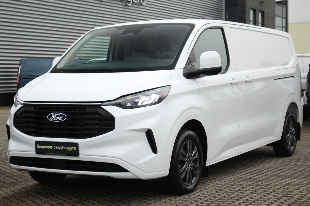 Ford E-Transit Custom 340 L2H1 Limited 71 kWh L2H1 Limited | Automaat | Trekgewicht 2300kg | L + R Zijdeur | Cruise | Stoel+Stuurvwer. | LED | Carplay | Keyless | Camera | Lease 771,- p/m 2