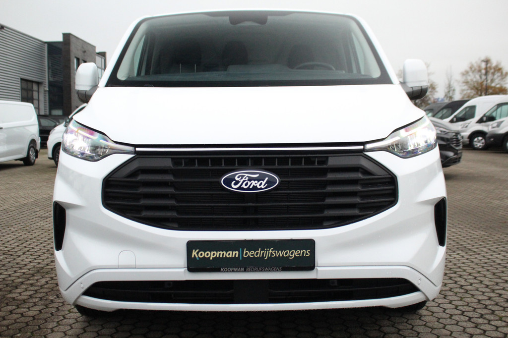 Ford E-Transit Custom 340 L2H1 Limited 71 kWh L2H1 Limited | Automaat | Trekgewicht 2300kg | L + R Zijdeur | Cruise | Stoel+Stuurvwer. | LED | Carplay | Keyless | Camera | Lease 771,- p/m 3