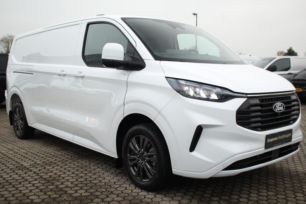 Ford E-Transit Custom 340 L2H1 Limited 71 kWh L2H1 Limited | Automaat | Trekgewicht 2300kg | L + R Zijdeur | Cruise | Stoel+Stuurvwer. | LED | Carplay | Keyless | Camera | Lease 771,- p/m 4