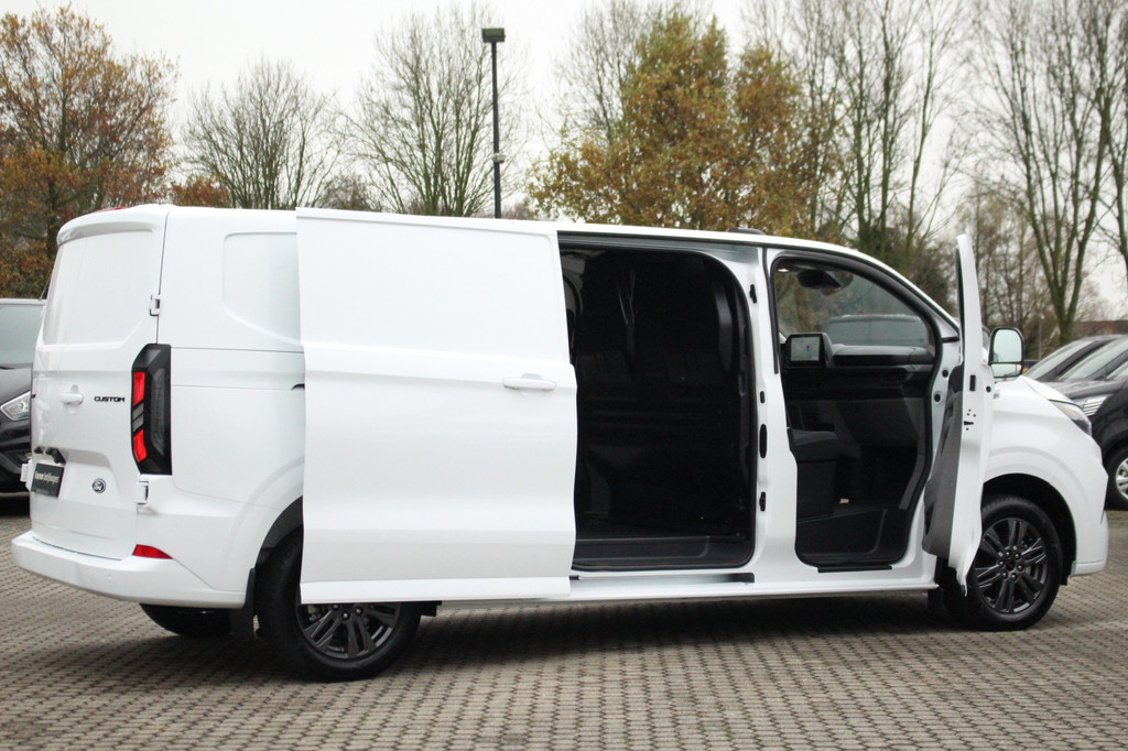 Ford E-Transit Custom 340 L2H1 Limited 71 kWh L2H1 Limited | Automaat | Trekgewicht 2300kg | L + R Zijdeur | Cruise | Stoel+Stuurvwer. | LED | Carplay | Keyless | Camera | Lease 771,- p/m 6