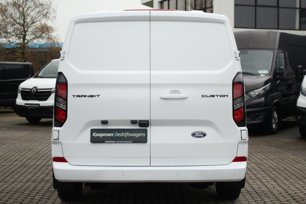 Ford E-Transit Custom 340 L2H1 Limited 71 kWh L2H1 Limited | Automaat | Trekgewicht 2300kg | L + R Zijdeur | Cruise | Stoel+Stuurvwer. | LED | Carplay | Keyless | Camera | Lease 771,- p/m 7