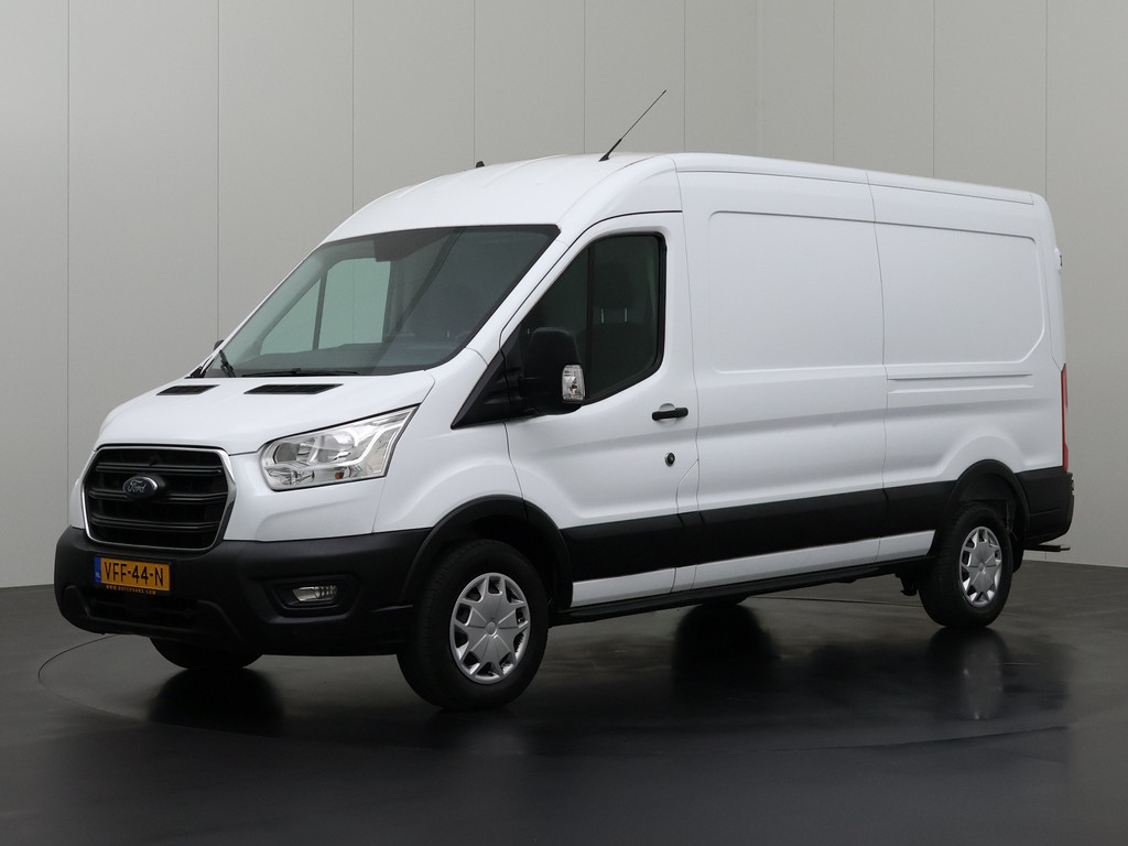 Ford Transit 2.0TDCI 130PK L3H2 RWD | Navigatie | Airco | Cruise | Trekhaak | Betimmering | 3-Persoons 7