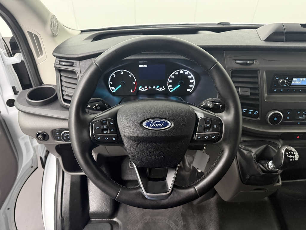 Ford Transit 2.0TDCi 130PK L2H2 | Airco | Cruise | 3-Zits | Betimmering 14