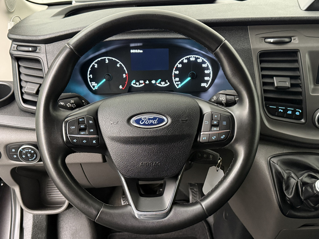 Ford Transit 2.0TDi 130PK L2H2 | Airco | Cruise | Trekhaak | 3-Persoons | Betimmering 14