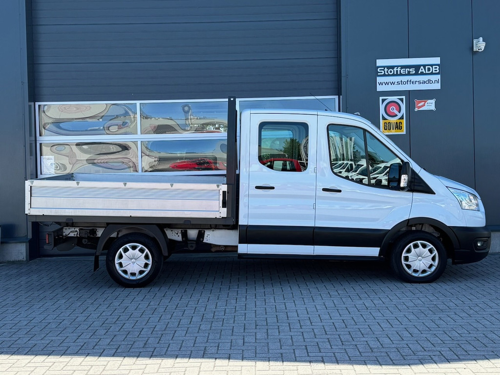 Ford Transit 310 2.0 TDCI 130pk L2H1 DC Trend | Open Laadbak | Trekhaak 2550KG | Airco | Kunstleder | Bluetooth | 7-persoons 7