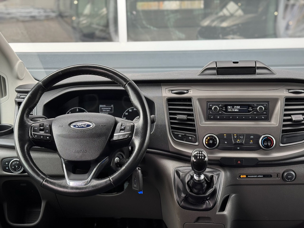 Ford Transit 350 2.0 TDCI L2H1 DC Trend 4WD | Open laadbak | Bluetooth | Kunstleder | 7-pers | Cruise| Radio | Airco | AWD 4x4 11