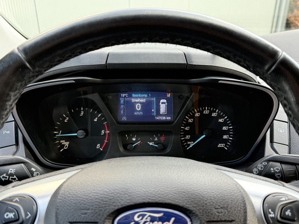 Ford Transit Custom 2.0 TDCI 131 PK E6 / L2H1 / 1e EIG. / 2.6 TONS TREKHAAK / AIRCO / CRUISE / NAVI / PDC 11
