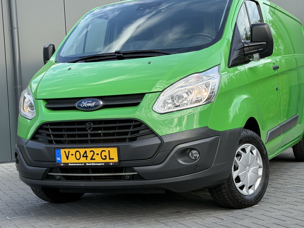 Ford Transit Custom 2.0 TDCI 131 PK E6 / L2H1 / 1e EIG. / 2.6 TONS TREKHAAK / AIRCO / CRUISE / NAVI / PDC 19