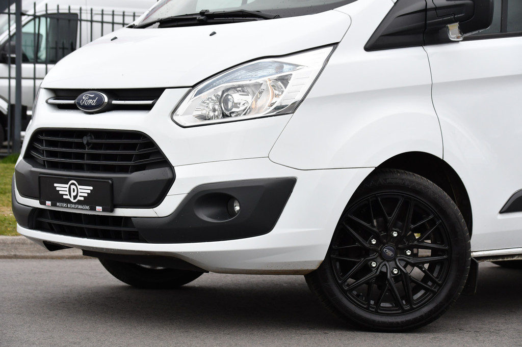 Ford Transit Custom 2.2 TDCI L1H1 Black & White Edition Cruise, Airco, Trekhaak, 100pk, 2 x Stoel, Voorruit verwarming, Uniek! 7