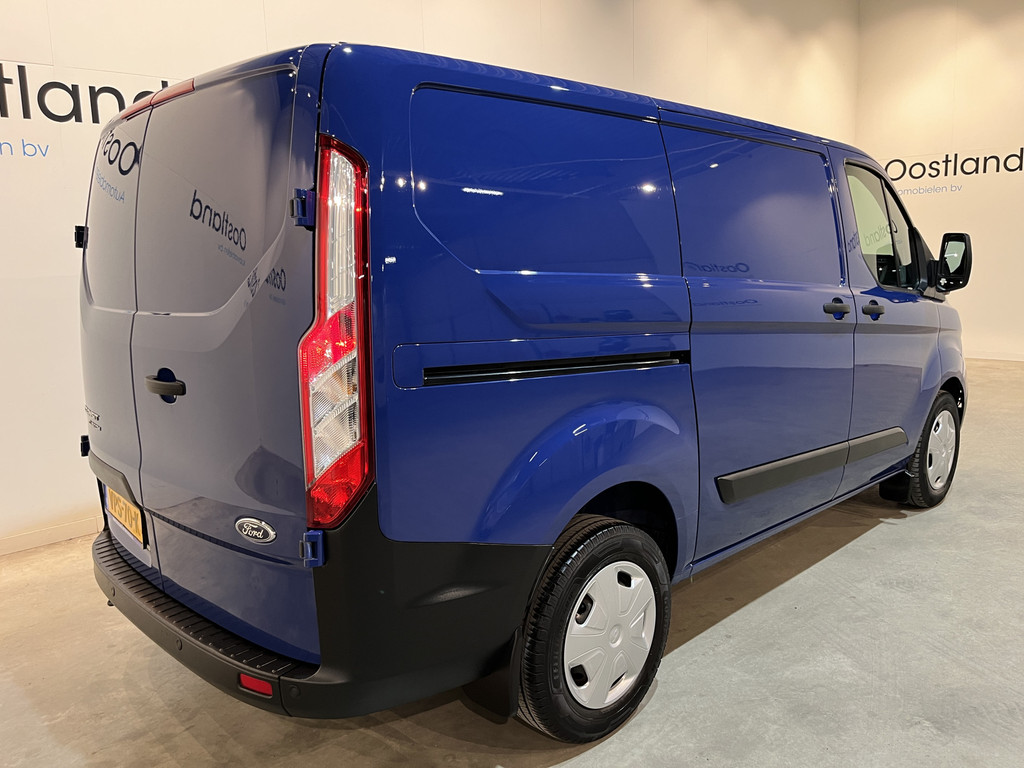 Ford Transit Custom 280 2.0 TDCI L1H1 Trend 130 PK Automaat / Euro 6 / Schuifdeur L + R / Airco / CarPlay / Cruise Control Adap. / Trekhaak / Navigatie / 3-Zits 18