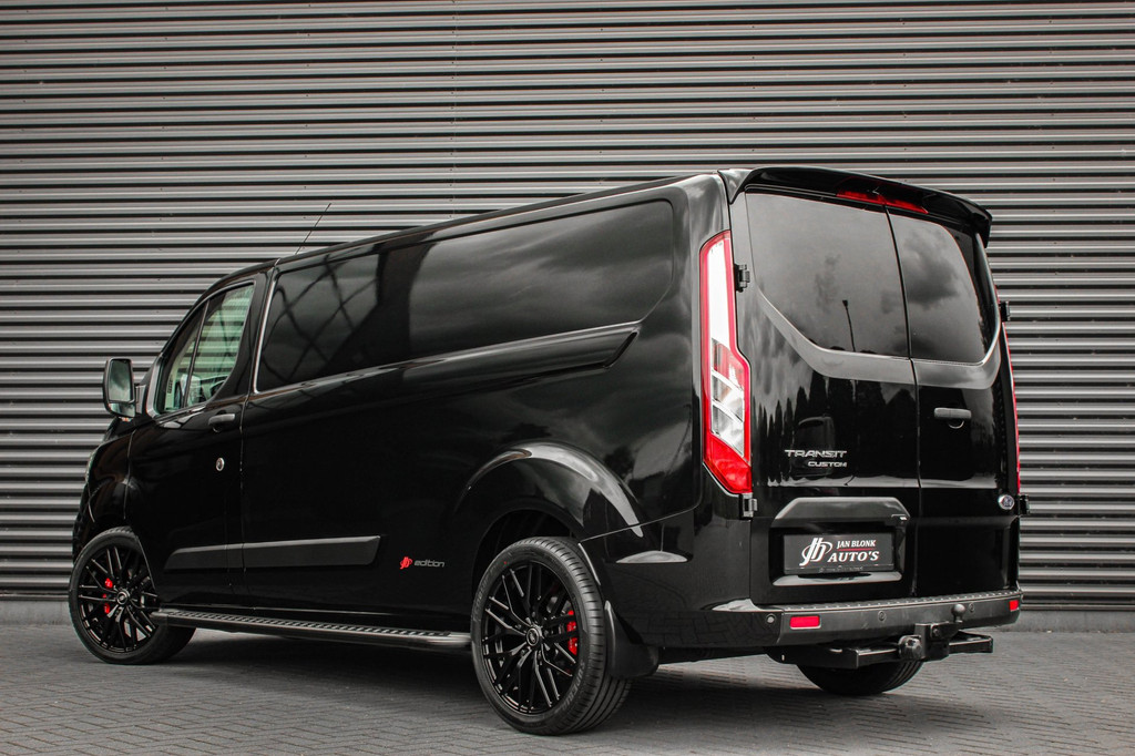 Ford Transit Custom 300 2.0 TDCI L2H1 JB-EDITION / 130PK AUTOMAAT / FULL BLACK / RAPTOR GRILL / SIDE-BARS / TREKHAAK /APPLECARPLAY 4