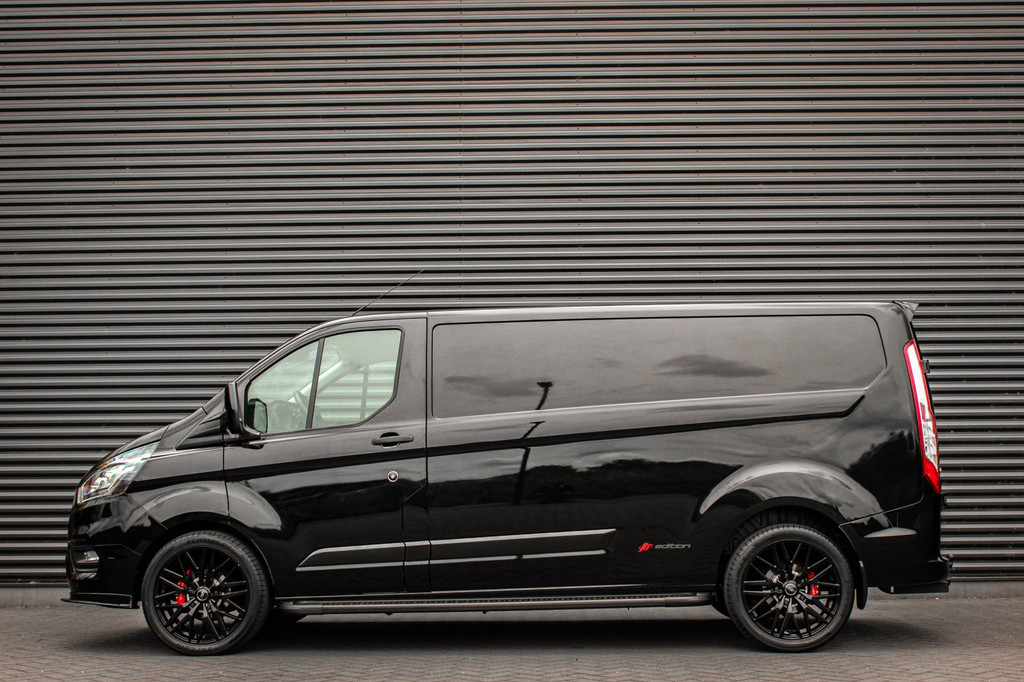 Ford Transit Custom 300 2.0 TDCI L2H1 JB-EDITION / 130PK AUTOMAAT / FULL BLACK / RAPTOR GRILL / SIDE-BARS / TREKHAAK /APPLECARPLAY 5