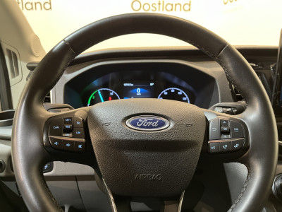 Ford E-Transit 390 (3500 kg) L2H2 Trend 68 kWh / 100% Elektrisch !! / Airco / Cruise Control / CarPlay / Camera / Navigatie / 3-Zits / 12.700 KM !! 12