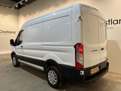 Ford E-Transit 390 (3500 kg) L2H2 Trend 68 kWh / 100% Elektrisch !! / Airco / Cruise Control / CarPlay / PDC / Navigatie / 3-Zits / 1.135 KM !! foto 17