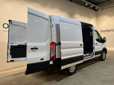 Ford E-Transit 390 (3500 kg) L2H2 Trend 68 kWh / 100% Elektrisch !! / Airco / Cruise Control / CarPlay / PDC / Navigatie / 3-Zits / 1.135 KM !! foto 20