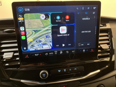 Ford E-Transit 390 (3500 kg) L2H2 Trend 68 kWh / 100% Elektrisch !! / Airco / Cruise Control / CarPlay / PDC / Navigatie / 3-Zits / 1.135 KM !! foto 9