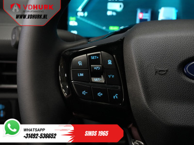 Ford E-Transit Custom L2 Limited 71 kWh 330 km WLTP LED/ Adapt.Cruise/ Standkachel/ Stoelverw./ Frontlip/ Sidebars/ Raptor/ Betimmerd/ Carplay/ 360.Camera/ Climate/ PDC/ 19?LMV/ Trekhaak 20