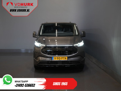 Ford E-Transit Custom L2 Limited 71 kWh 330 km WLTP LED/ Adapt.Cruise/ Standkachel/ Stoelverw./ Frontlip/ Sidebars/ Raptor/ Betimmerd/ Carplay/ 360.Camera/ Climate/ PDC/ 19?LMV/ Trekhaak 7