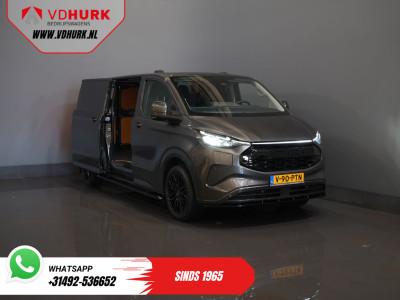 Ford E-Transit Custom L2 Limited 71 kWh 330 km WLTP LED/ Adapt.Cruise/ Standkachel/ Stoelverw./ Frontlip/ Sidebars/ Raptor/ Betimmerd/ Carplay/ 360.Camera/ Climate/ PDC/ 19?LMV/ Trekhaak 9