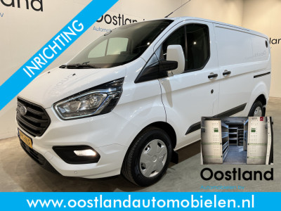 Ford Transit Custom 2.0 TDCI L1H1 Trend 130 PK / Servicebus / Bott Inrichting / Euro 6 / Schuifdeur L+R / Airco / CarPlay / Cruise Control / Camera / Navigatie / Klep / 3-Zits