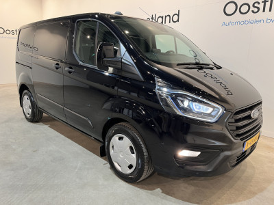 Ford Transit Custom 300 2.0 TDCI L1H1 Trend 130 PK Automaat / Euro 6 / Schuifdeur L + R / Airco / CarPlay / Cruise Control Adap. / Trekhaak / Xenon / Navigatie / 3-Zits / 27.300 KM !! foto 19