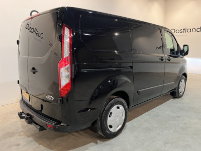 Ford Transit Custom 300 2.0 TDCI L1H1 Trend 130 PK Automaat / Euro 6 / Schuifdeur L + R / Airco / CarPlay / Cruise Control Adap. / Trekhaak / Xenon / Navigatie / 3-Zits / 27.300 KM !! foto 20