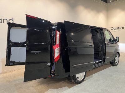 Ford Transit Custom 300 2.0 TDCI L1H1 Trend 130 PK Automaat / Euro 6 / Schuifdeur L + R / Airco / CarPlay / Cruise Control Adap. / Trekhaak / Xenon / Navigatie / 3-Zits / 27.300 KM !! foto 21