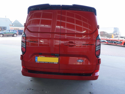 Ford Transit Custom 320L 2.0 TDCI 136pk L2H1 Limited Nr. V153 | Airco | Adap.cruise | Navi | Glaslookpanelen | Spoilers foto 6