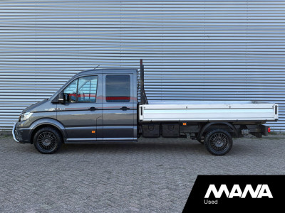 MAN TGE 35 2.0 3.180 L4 4x4 DC Open Laadbak LED Automaat Airco Cruise ACC foto 2