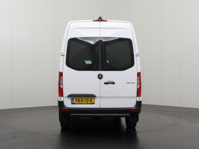 Mercedes-Benz Sprinter 315CDI Automaat L2H2 | 3500Kg Trekgewicht | Navigatie | Camera | Airco | Cruise | 3-Zits foto 11
