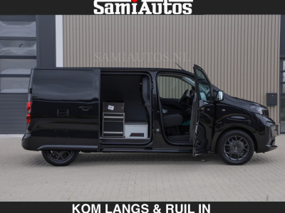 Opel Vivaro BLACK OPS | GEHEEL COMPLEET | HOUTEN VLOER EN WANDEN 3 PERSSONS | 2 DELIG ACHTER DEUREN | LADE SCHUIF BAK | 2.0D 180 PK S&S L2 H1 | FULL LED | SCHUIF DEUR | GEHEEL ZWART | MOOIE STOERE BUS | foto 15