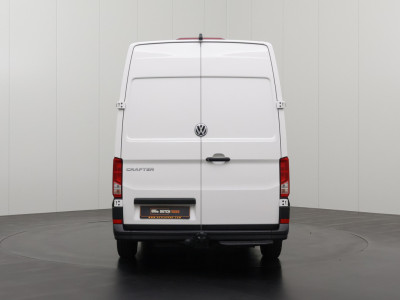 Volkswagen Crafter 2.0TDI 140PK DSG Automaat L3H3 | Kastinrichting | Airco | Cruise | 3-Zits | Betimmering | 3000Kg Trekhaak foto 11