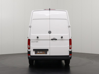 Volkswagen Crafter 2.0TDi 177PK Automaat L3H3 | 2xSchuifdeur | LED | Navigatie | Camera | Multimedia | Airco | Cruise | 3-Zits foto 11