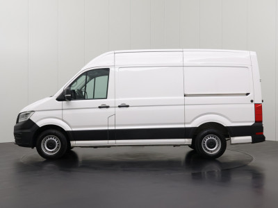 Volkswagen Crafter 2.0TDi 177PK Automaat L3H3 | 2xSchuifdeur | LED | Navigatie | Camera | Multimedia | Airco | Cruise | 3-Zits foto 12